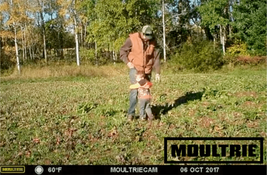 image of woods wth man and animal from the Moultrie EDGE 2 and EDGE 2 PRO Cellular Trail Cameras featured in Father’s Day sale.
