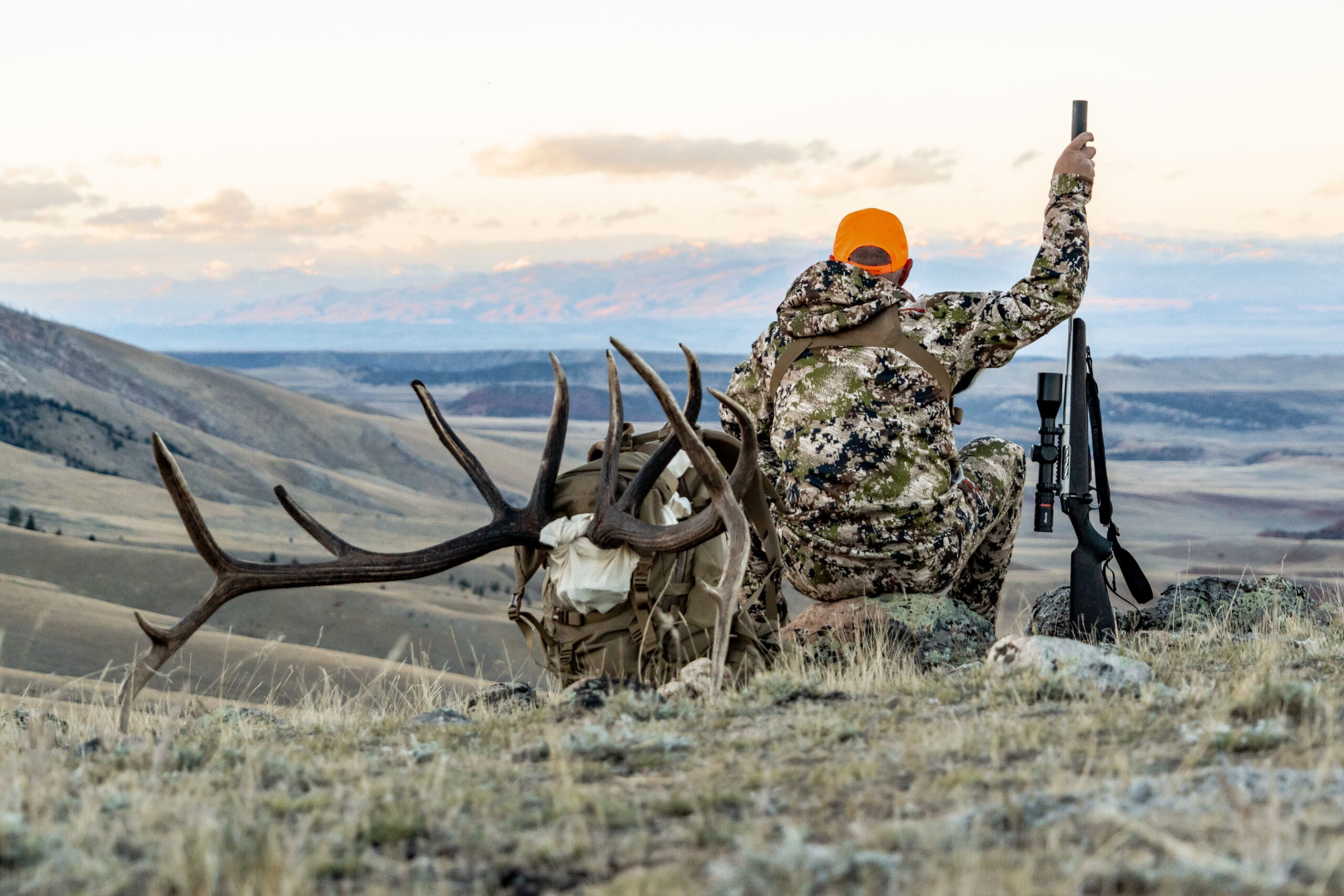 Rifle alongside Remington ammunition featured in tactical marketing agency photoshoot.