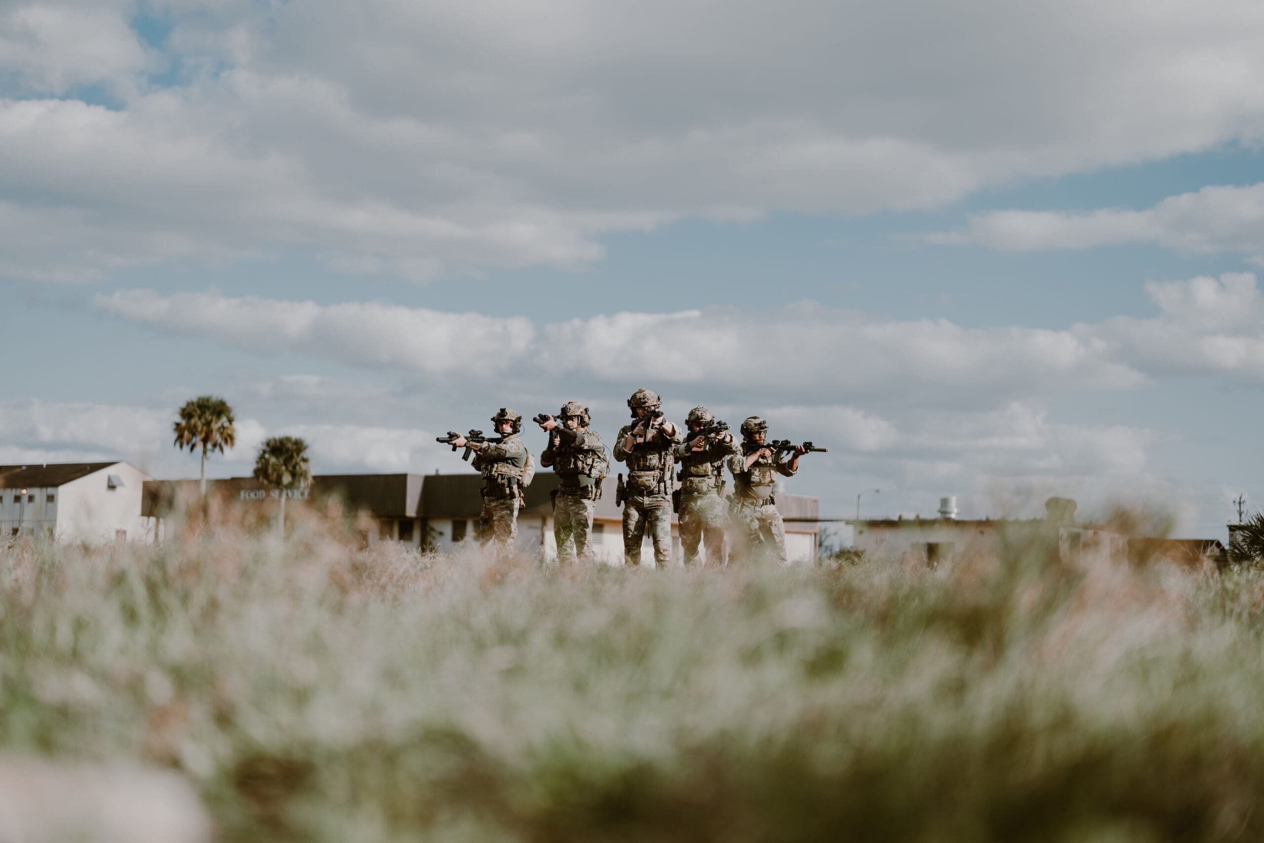 crew of military men in a field